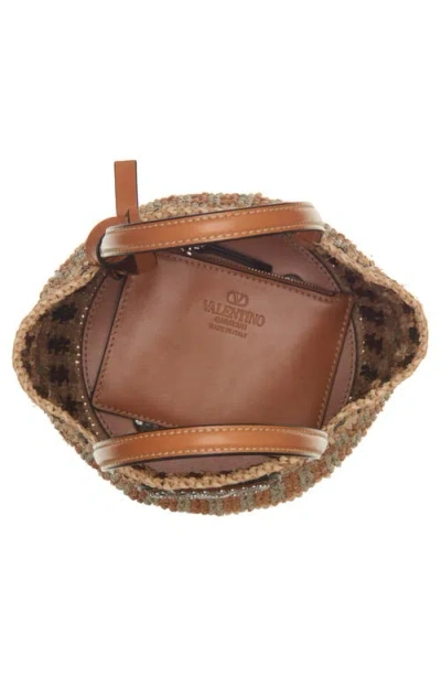 Valentino Garavani Small Vlogo Signature Crocheted Raffia Bucket Bag In Brown