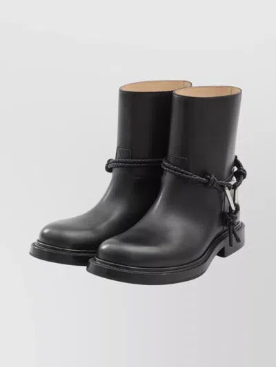 Bottega Veneta Women Black Ankle Boots With Metallic Detail On The Side And Applied Laces In Leather In Animal Print