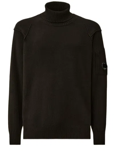 C.p. Company Lambswool Turtleneck With Ribbed Detailing And Lens Pocket In Black
