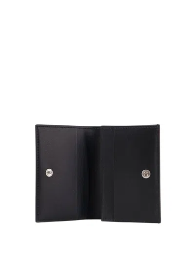 Jil Sander Compact Leather Cardholder Featuring Metal Eyelets In Black