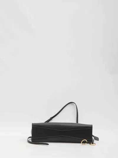 Alaïa Alaia Women East West Leather Shoulder Bag With Engraved Lettering Logo In Black