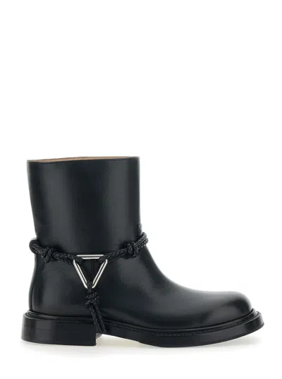 Bottega Veneta Women Black Ankle Boots With Metallic Detail On The Side And Applied Laces In Leather In Animal Print
