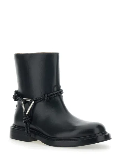 Bottega Veneta Women Black Ankle Boots With Metallic Detail On The Side And Applied Laces In Leather In Animal Print
