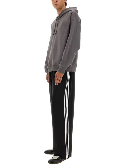 Y-3 Hoodie Featuring Graphic Design On Back In Brown