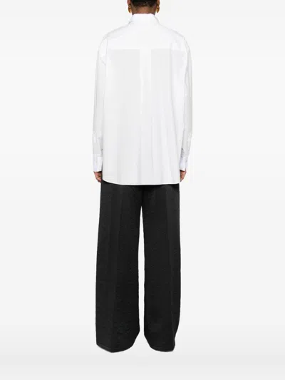 Forte Forte Long Sleeve Top With Curved Hem And Pocket In White