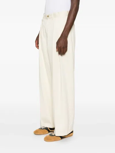 Studio Nicholson Double-pleat Trousers In Neutral