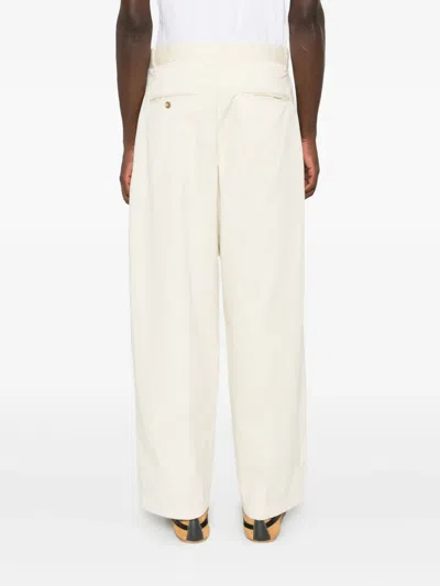 Studio Nicholson Double-pleat Trousers In Neutral