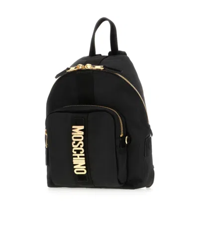 Moschino Logo-lettering Front-pocket Backpack In Black