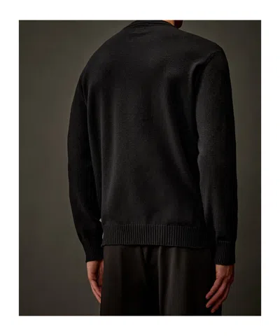 C.p. Company Crew Neck Knit Sweater With Raglan Sleeves And Logo Patch In Black