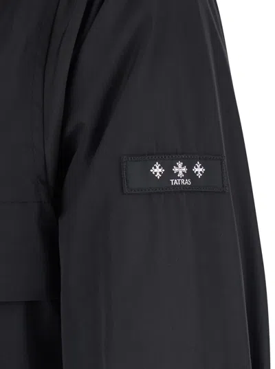 Tatras Black Jacket With Drawstring Hood And Logo Patch On The Sleeve In Tech Fabric Man In Black