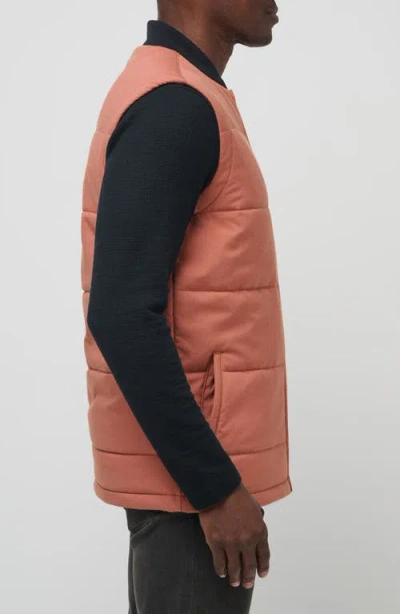 Travismathew Climate Drop Quilted Vest In Orange