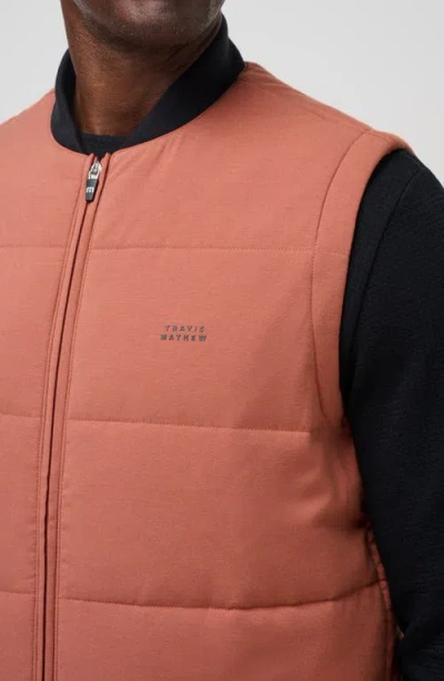 Travismathew Climate Drop Quilted Vest In Orange