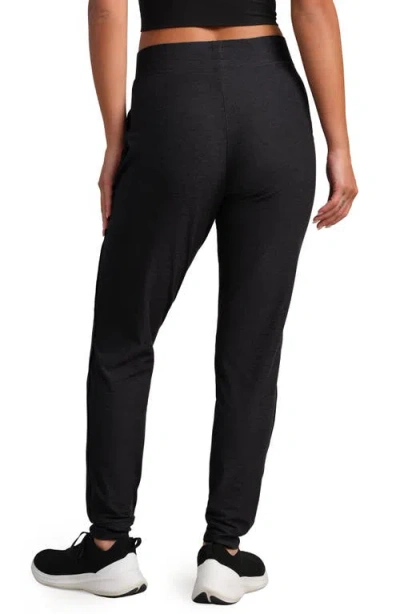 Rhone Dreamglow Taper Leg Pants In Black
