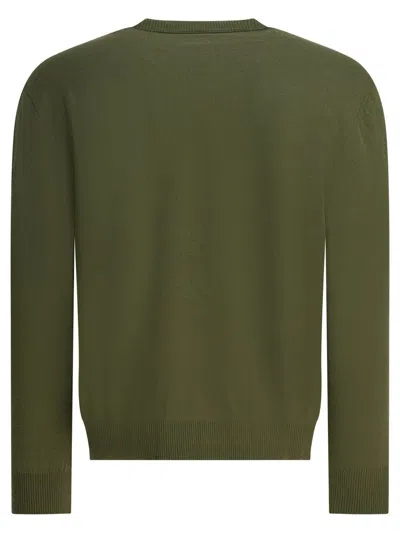 C.p. Company Crew Neck Knitwear With Ribbed Cuffs And Pocket In Green