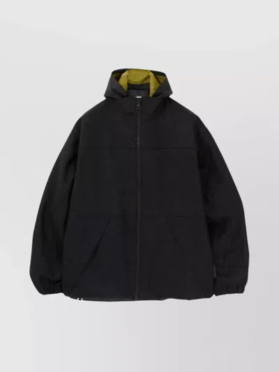 Gr10k Hooded Black Logo Jacket With Contrasting Lining And Adjustable Features In Black