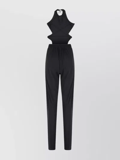 Amazuìn Sleek Elasticated Jumpsuit With Open Back And Draped Legs In Black