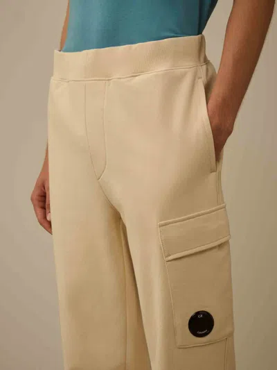 C.p. Company Pocket Lens Trousers In Neutral