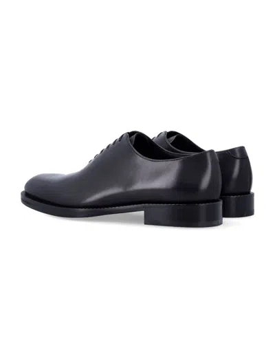 Ferragamo Almond Toe Brogues With Double Leather Sole In Black