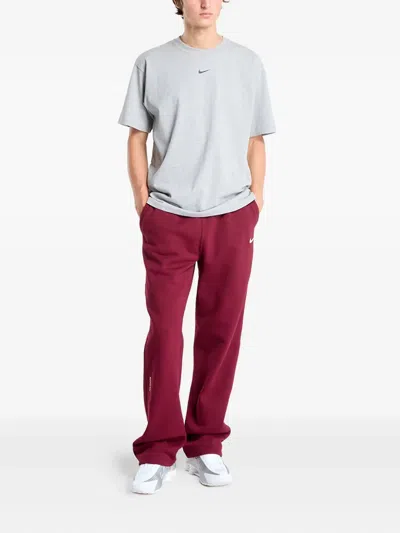 Nike X Nocta Elastic-waistband Track Pants In Red
