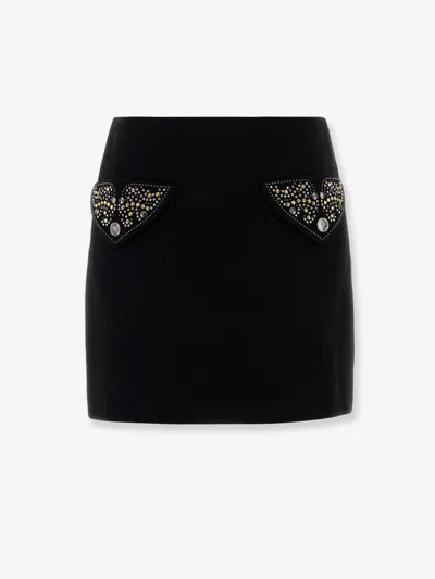 Versace Chic Fitted Mini Skirt With Embellished Pockets In Black