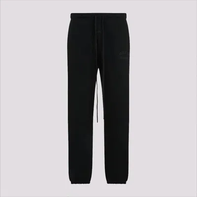 Fear Of God Tapered Black Jogger Pants With Adjustable Drawstring And Elastic Cuffs In Black