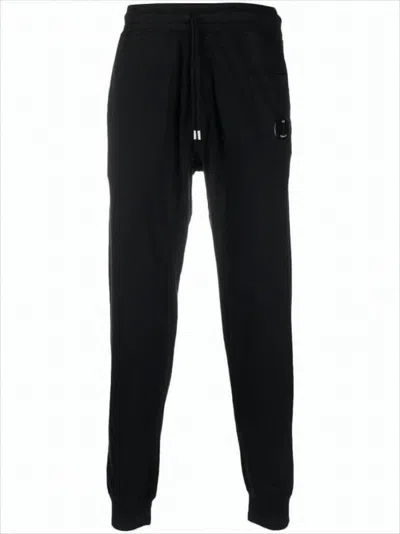 C.p. Company Relaxed-fit Tapered Jogger Pants With Logo Detail In Black
