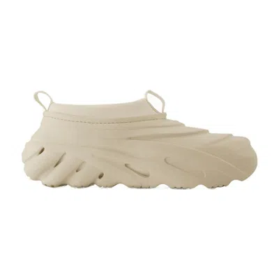 Crocs Ivory Rubber Echo Storm Slip Ons In Animal Print