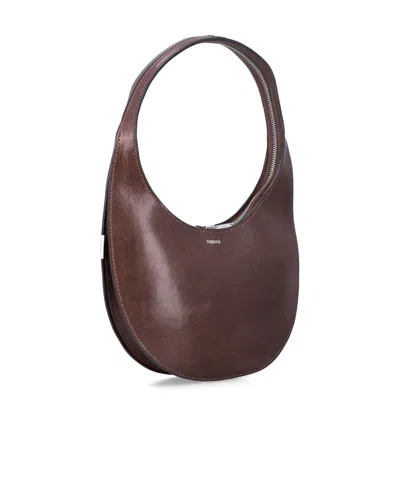 Coperni Small Curved Shoulder Bag Top Handle In Brown