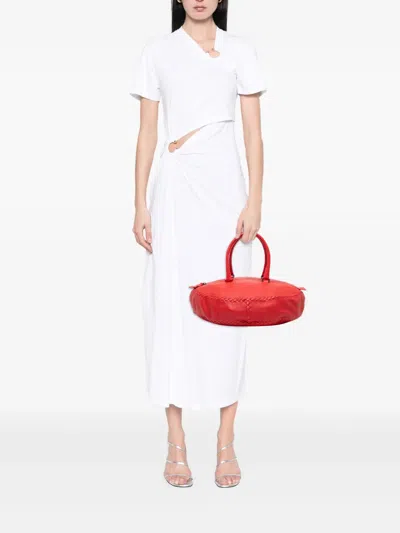 Pre-owned Bottega Veneta 2009 Intrecciato Trimmed Cervo Disk Handbag In Red