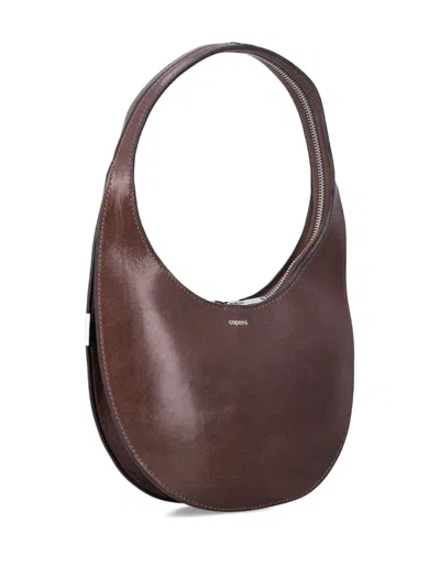 Coperni Small Curved Shoulder Bag Top Handle In Brown
