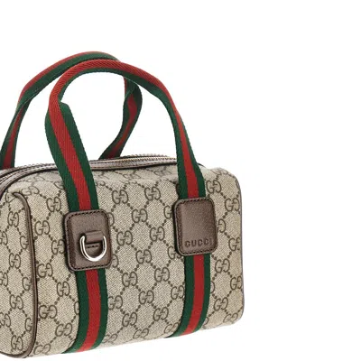 Gucci Mini Gg Duffle Bag In Brown