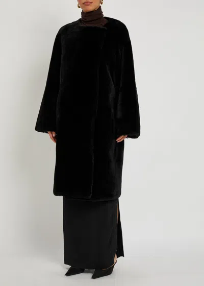 Totême Open Front Shearling Mid-length Coat In Black
