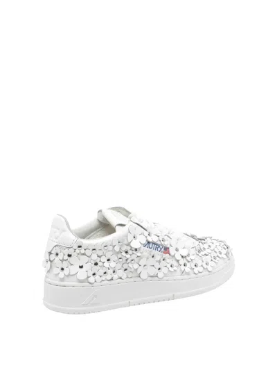 Autry Low-top Sneakers With Clean Silhouette And Rounded Toe In White