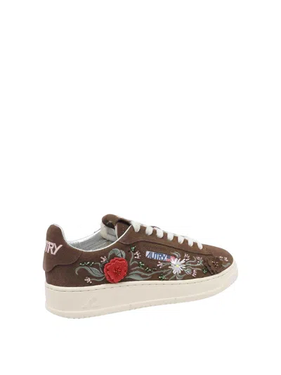 Autry Low-top Sneakers With Floral Embroidery In Rich Brown In Brown