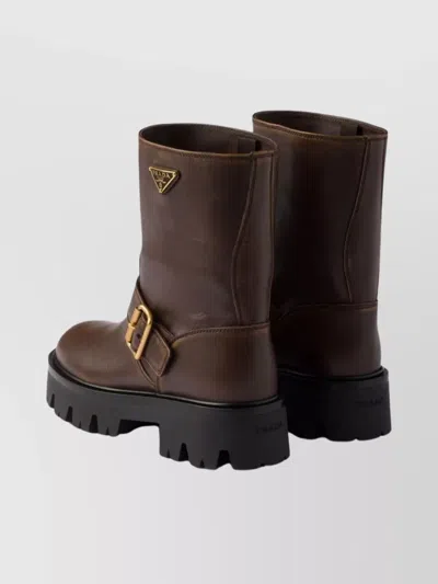 Prada Triangle Logo Distressed Leather Ankle Boots In Brown