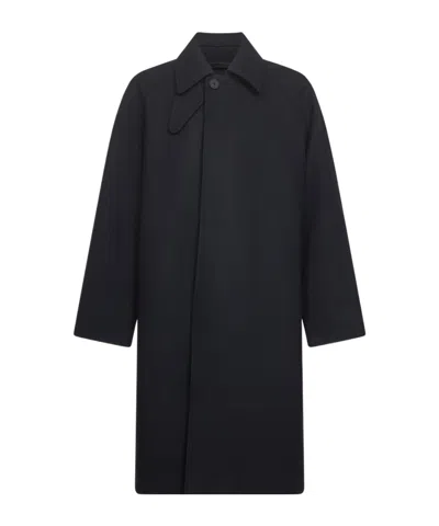 Studio Nicholson Long Coat With Buttoned Cuffs And Pockets In Black