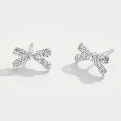 Fashnzfab White Gold Dipped Cz Stone Paved Mini Bow Stud Earrings - Silver In Metallic