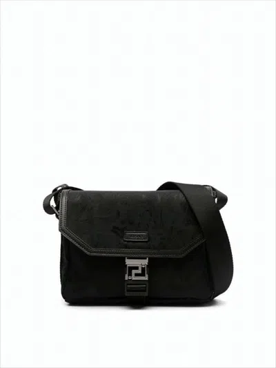 Versace Embossed Polyamide Crossbody Bag With Metallic Buckle In Black