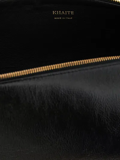 Khaite Kye Glossed-leather Shoulder Bag In Black