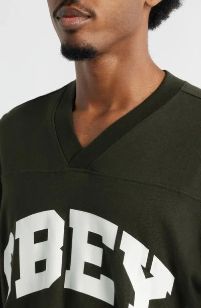 Obey Logo Graphic Football Jersey In Green