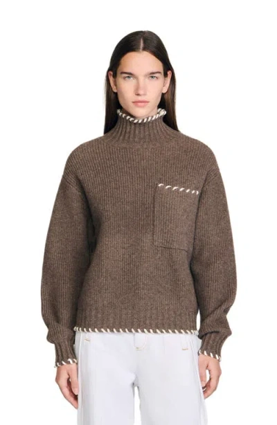 Sandro Oversized Turtleneck Sweater In Multi