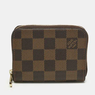 Pre-owned Louis Vuitton Damier Ebene Canvas Zippy Coin Purse In Brown