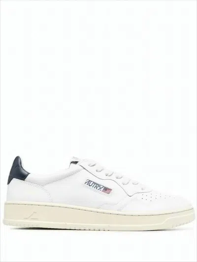 Autry Minimalist Low-top Sneakers With Perforated Detailing In White