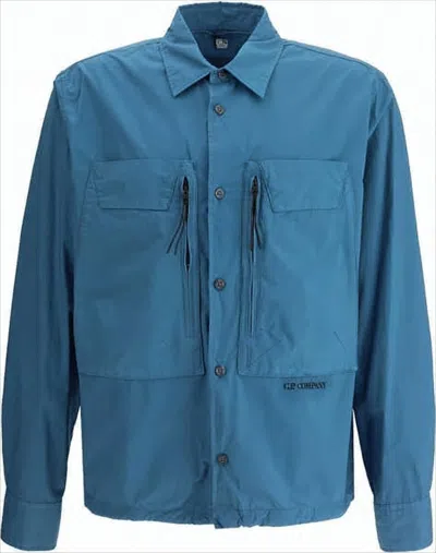 C.p. Company Button-up Casual Jacket With Flap And Zipper Pockets In Blue