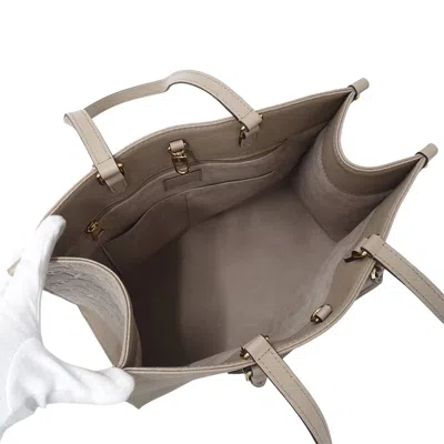 Pre-owned Louis Vuitton Beige Tourterelle Monogram Empreinte Handbag Tote Bag () In Brown