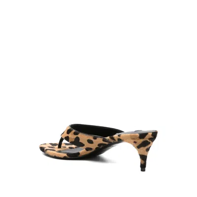 Alaïa Animal Flip Flops Mules In Brown