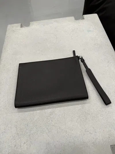 Balenciaga Textured Leather Pouch Wrist Strap In Black