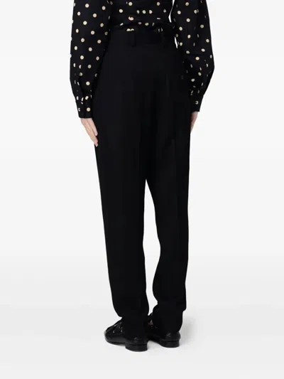 Moschino Pressed-crease Trousers In Black