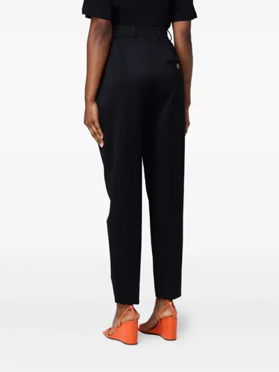 Moschino Pleated Trousers In Black