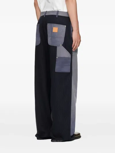 Khoki Pinstripe Panelled Trousers In Blue